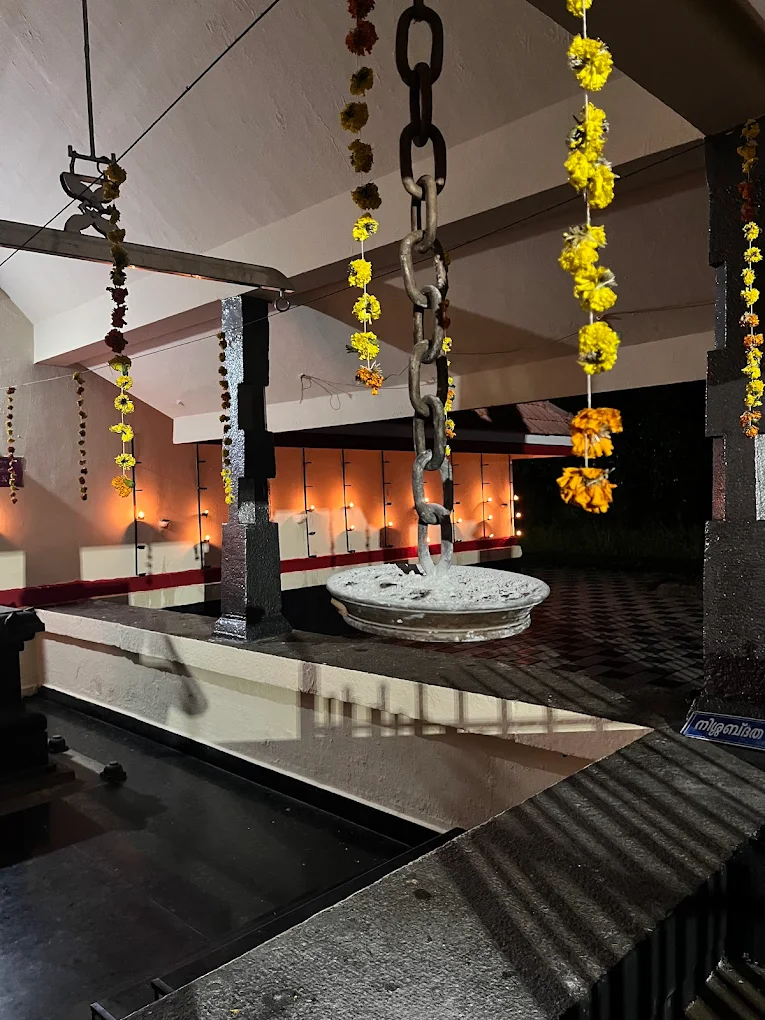 Devotees performing rituals at Akapparambu Sreekrishna Swamy Temple during festival celebrations