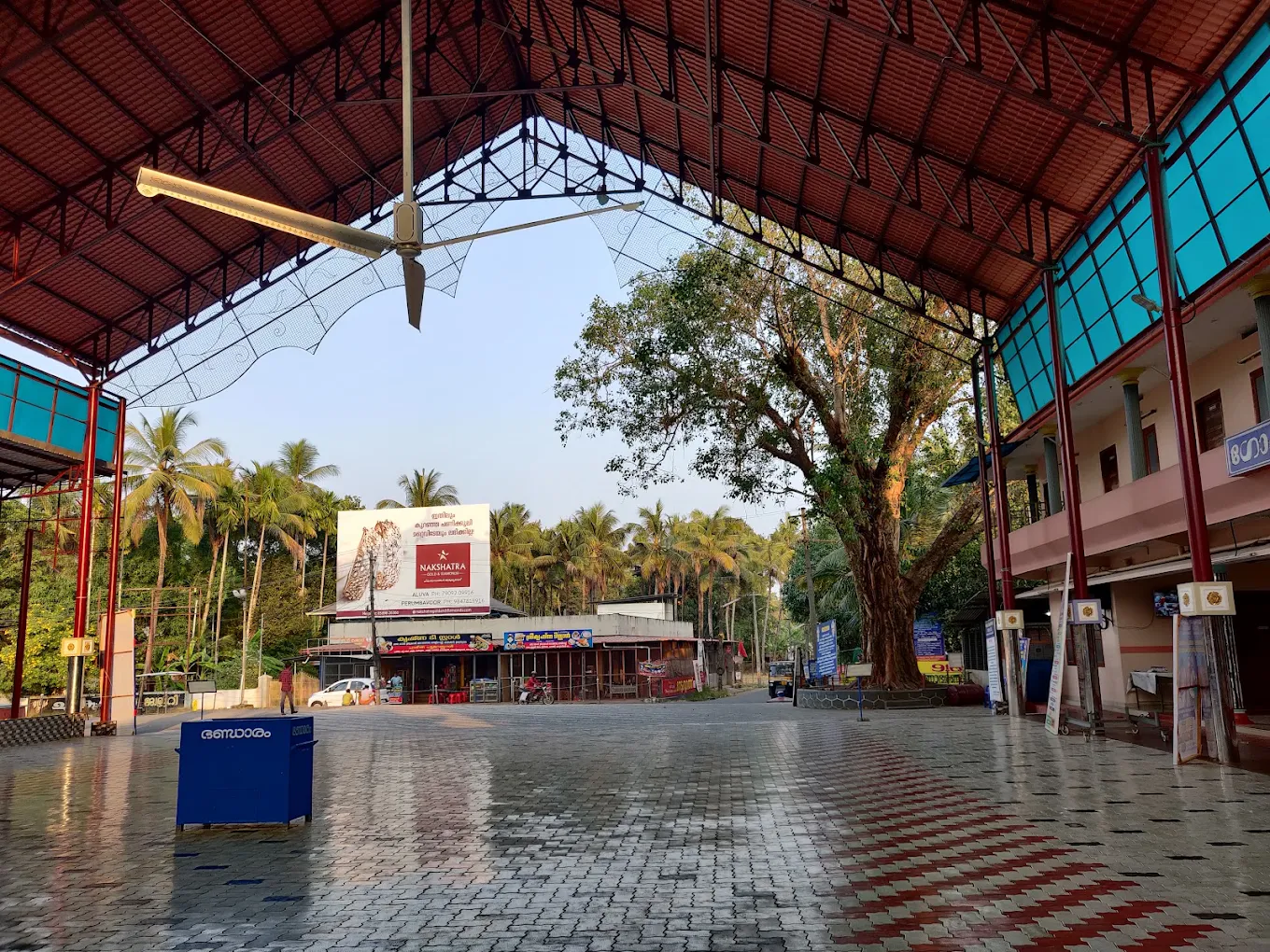 Devotees performing rituals at Chelamattam Sreekrishnaswami Temple during festival celebrations