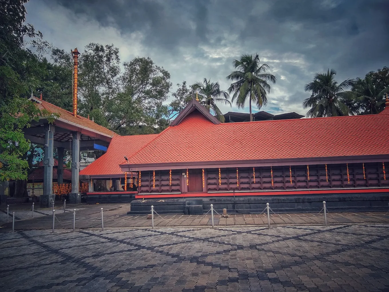 Scenic view of Pavakulam Sree Mahadeva Temple adorned with lamps and devotional decorations