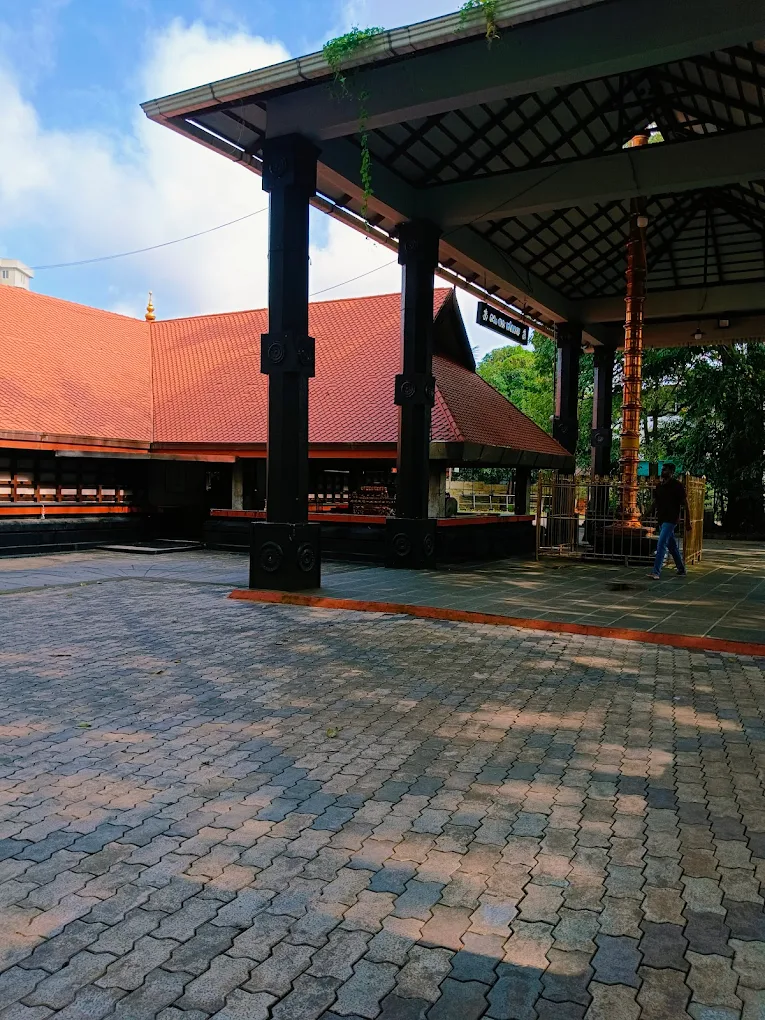Devotees performing rituals at Pavakulam Sree Mahadeva Temple during festival celebrations