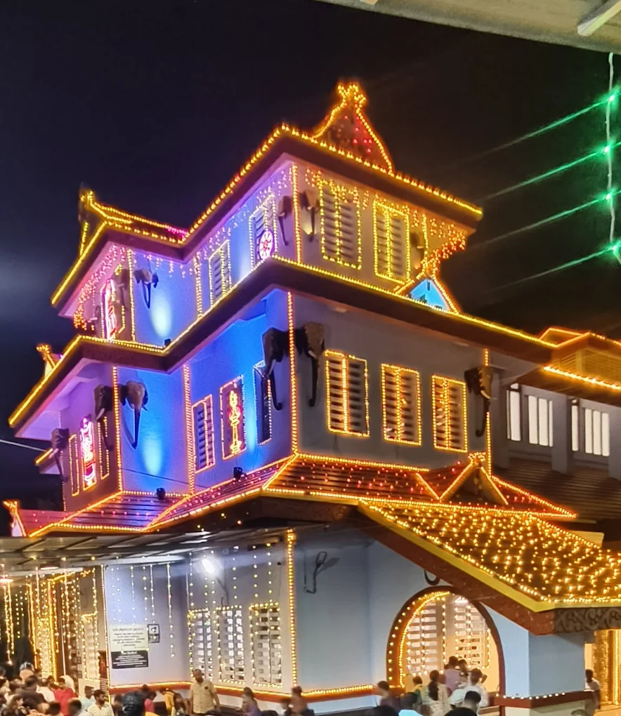 Devotees worship at Parassinikadavu Sri Muthappan Temple