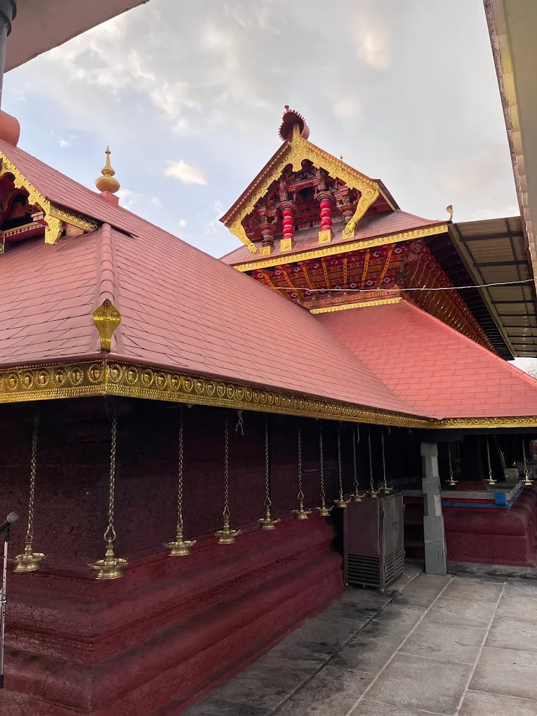 Kerala temple architecture Payyanur Subrahmanya Swami shrine compound wall view