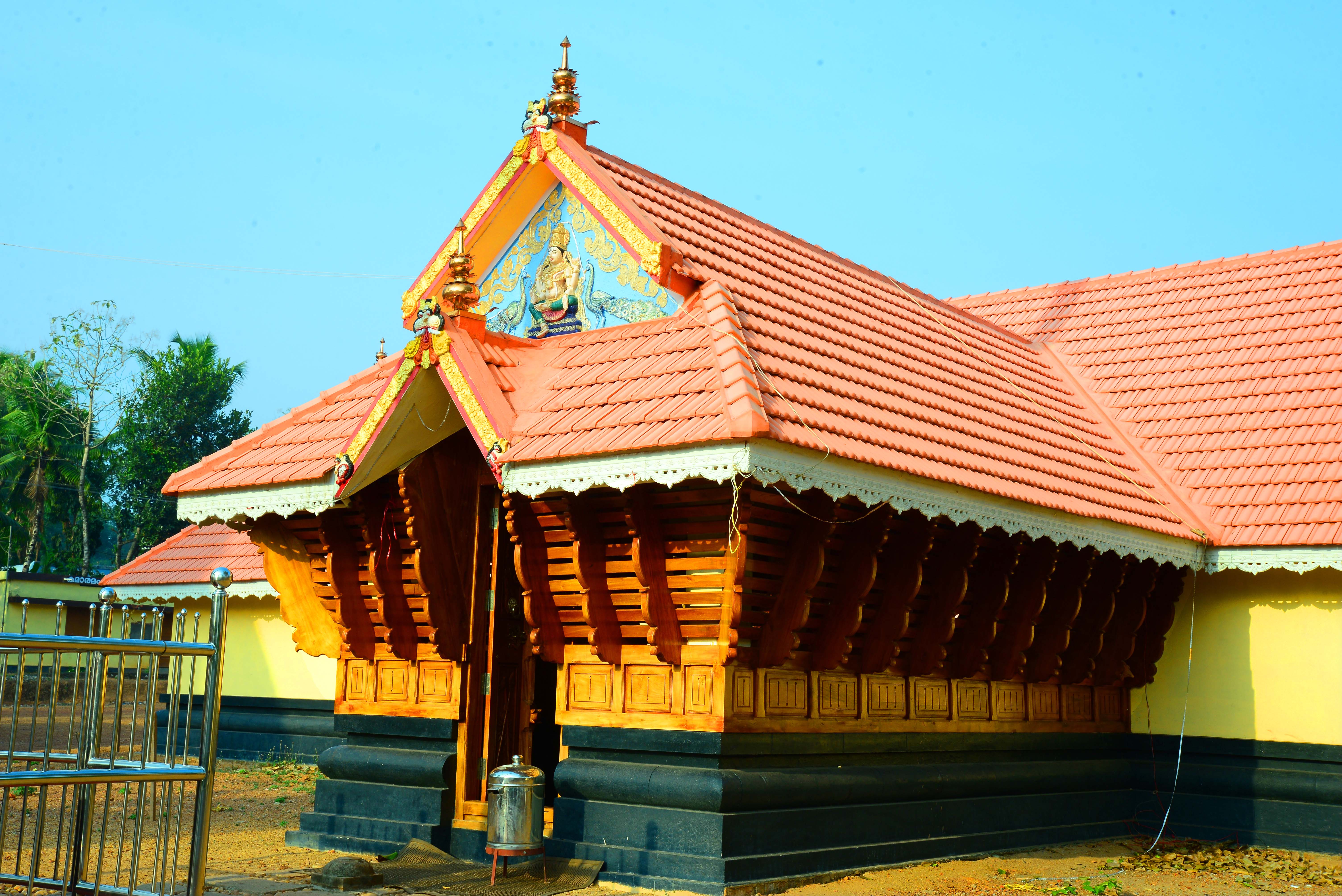 Devotees performing Kumbham Pooyam festival at Sree Kumaramangalam Temple