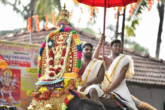 Devotees performing Chathushshatham with flower offerings and chants