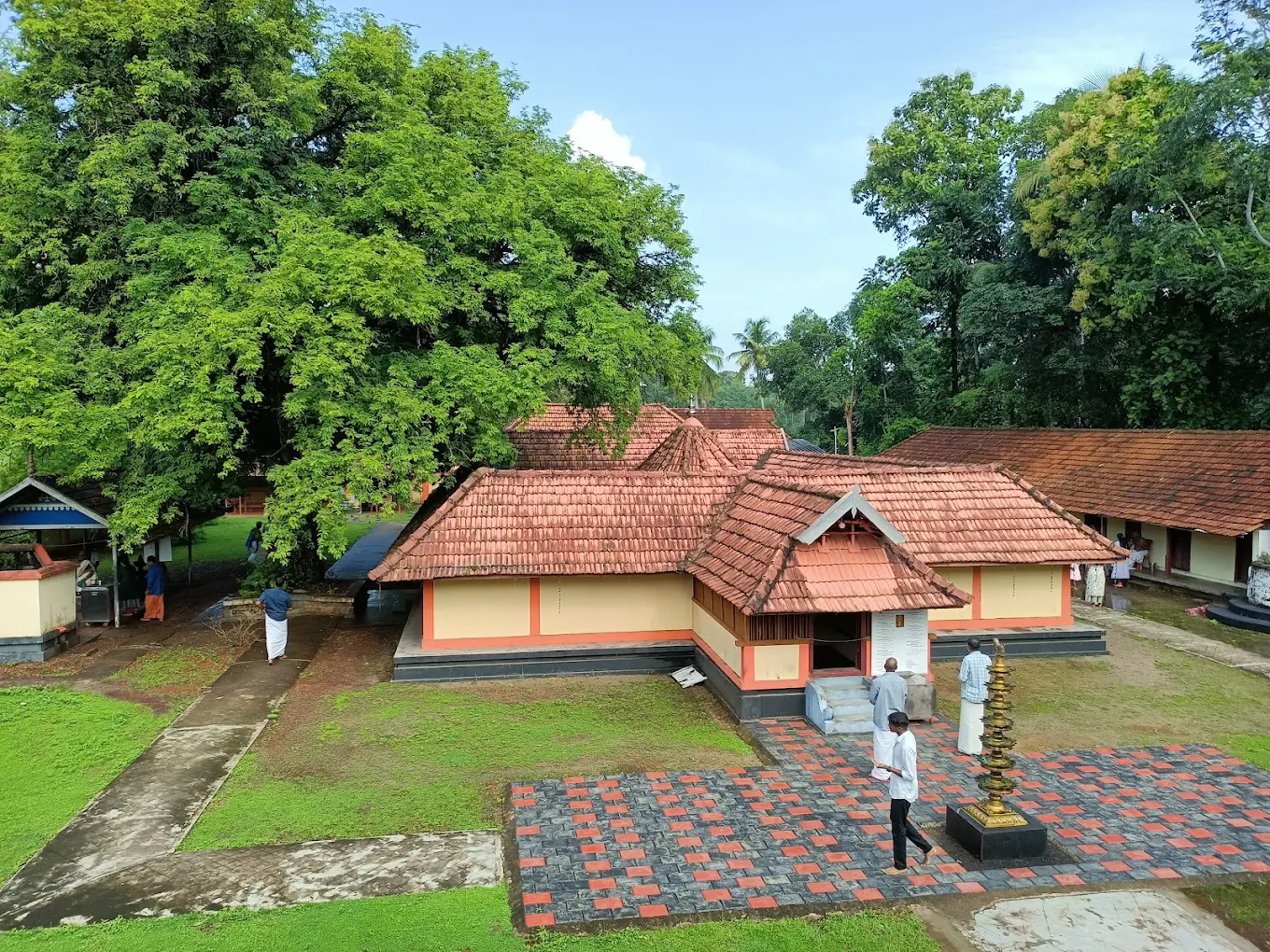 Adithyapuram Suryadeva Temple lamp and courtyard