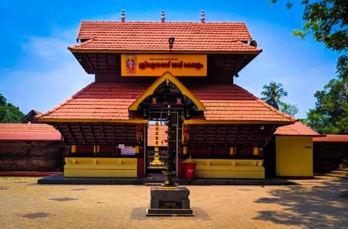 Temple entrance with traditional Kerala architecture at Valayanad Devi Temple
