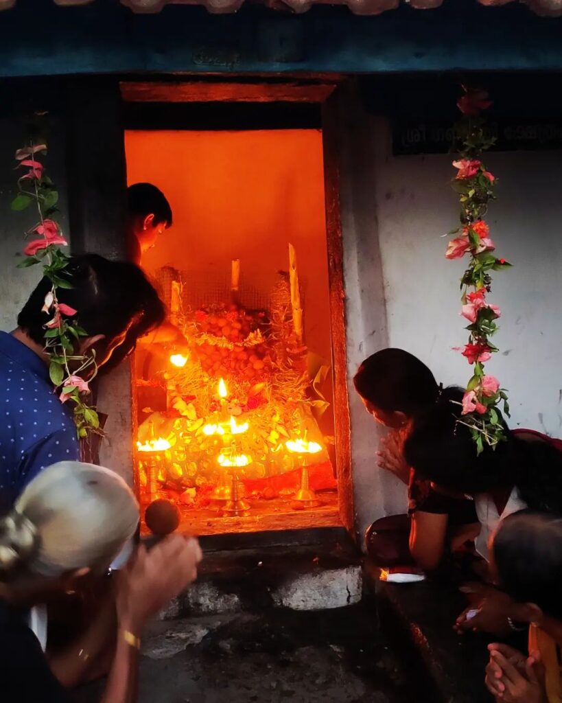 Devotees attending Navaratri puja at Thiruvalathur Sree Randumoorthi Temple