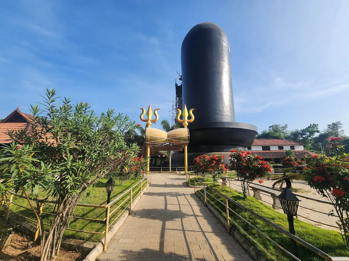 Temple entrance decorated with traditional Kerala architecture and carvings