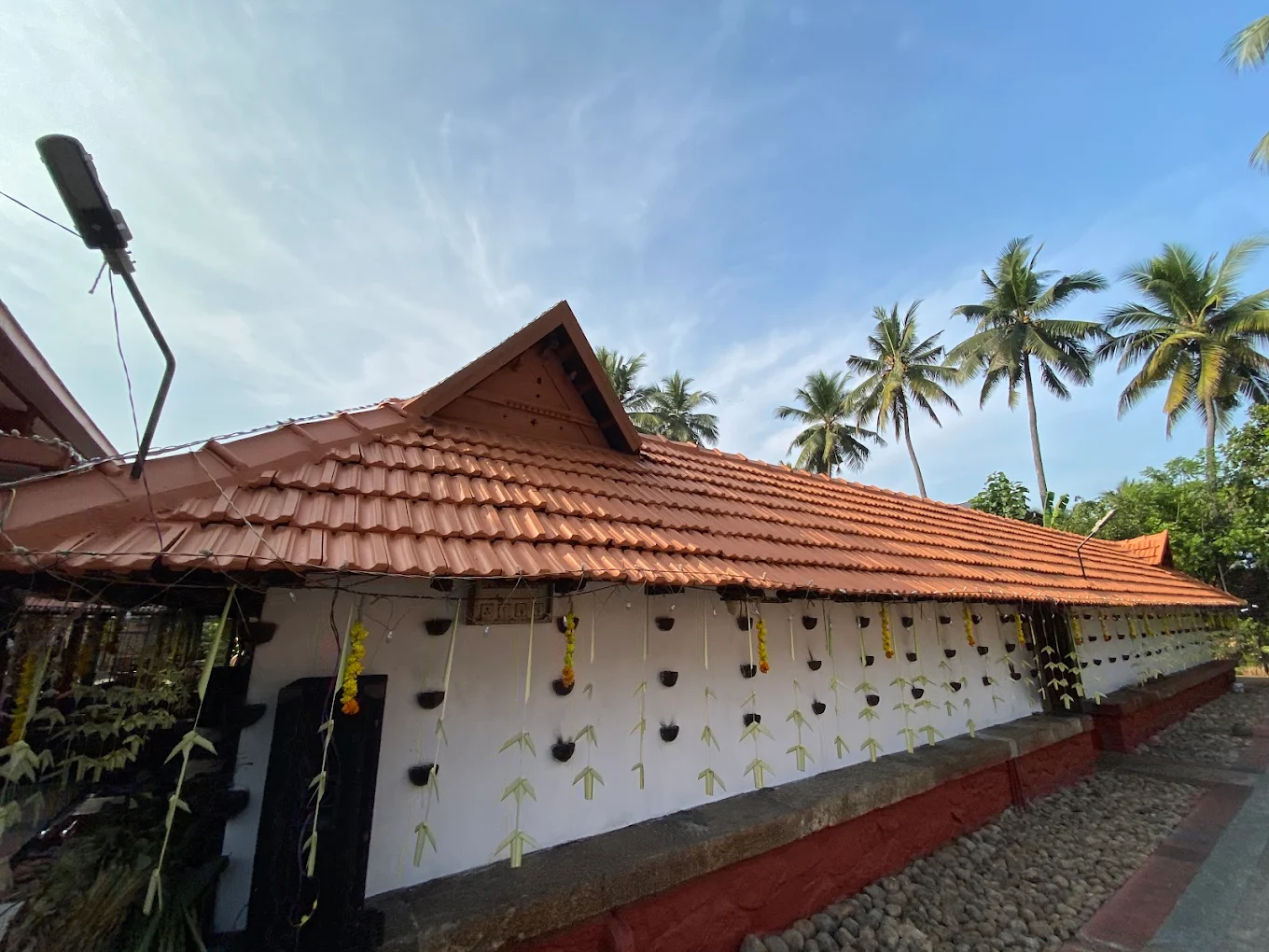 Festival celebrations at Thycaud Sri Dharma Sastha Temple with decorated sanctum and devotees