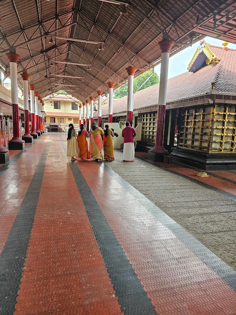Festival celebrations at Sree Udiyanoor Devi Temple with decorated sanctum and devotees